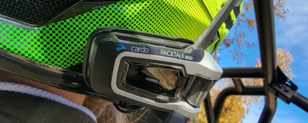 Cardo Systems Packtalk Bold on helmets.