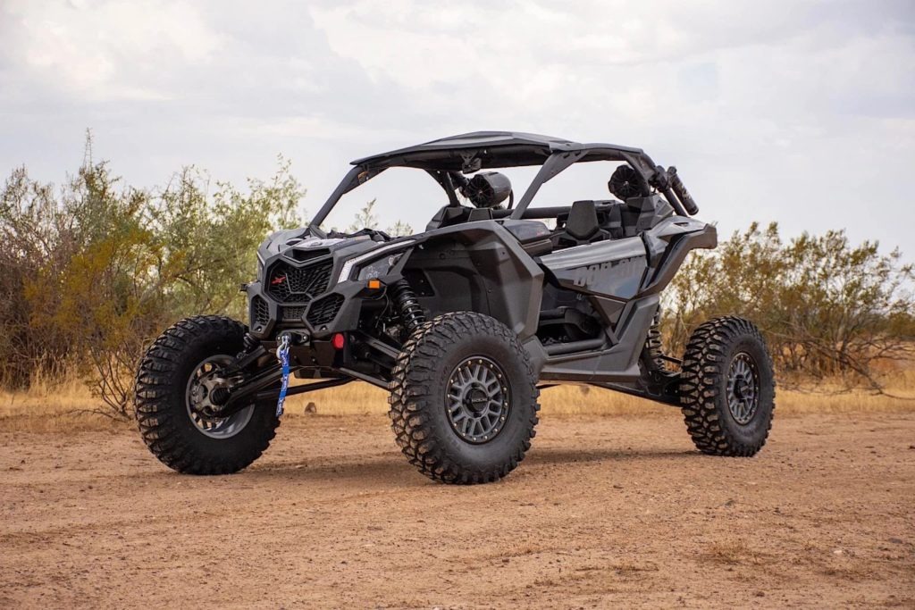 A Can-Am UTV on dirt roads.