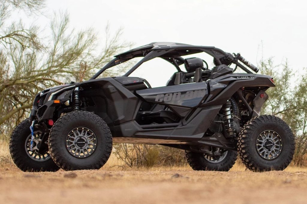 Raceline-Podium-16-1536x1024.jpg A Can-Am Raceline UTV was on a dirt road.