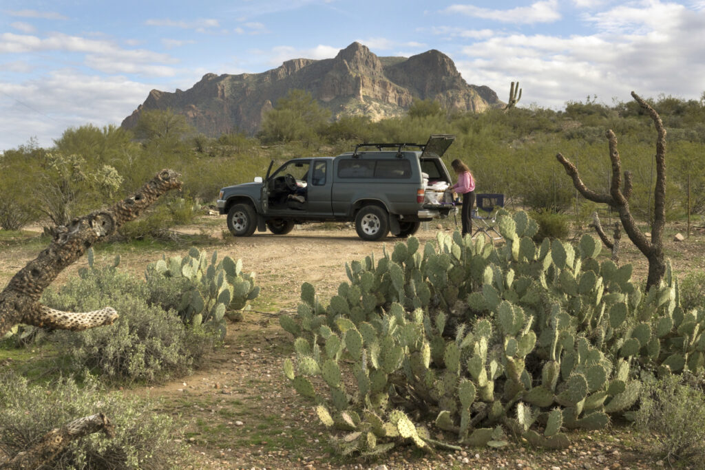 Woman truck camping Sonoran Desert Picketpost Mountain Tonto National Forest Arizona